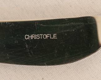 Closeup of the set of Christofle France silver plated handled stainless blade dinner knives and butter knives