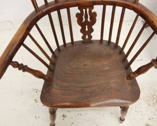 Antique handcrafted Windsor chair 18th C. The out swept arms formed from steam bent pieces of wood giving a lovely, curved shape; has a steam bent “concave crinoline” stretcher.