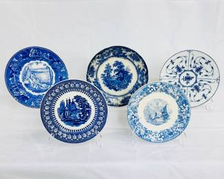 Vintage and antique transfer ware blue and white plates including a Petrus Regout & Co. decorative plate Agra blue, and a Ferrara Etruria England Wedgwood blue and white plate with central scene of sailing ships and floral border