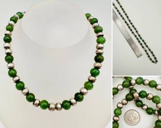 Closeup of the green jade and silver metal bead necklace