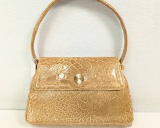 Classic alligator leather handbag in golden beige color