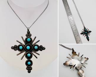 Native American silver cross set with turquoise colored stones on an 18" chain, unsigned.