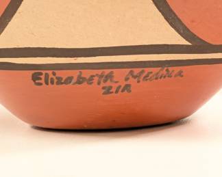 Closeup of the traditional Zia Pueblo jar with turtle lid by Elizabeth Medina