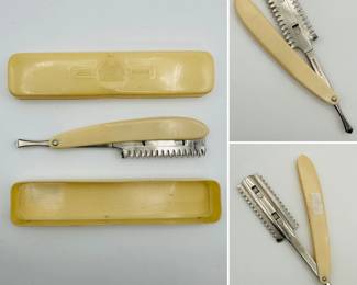 A vintage Durham Duplex straight razor with celluloid handle and original celluloid case