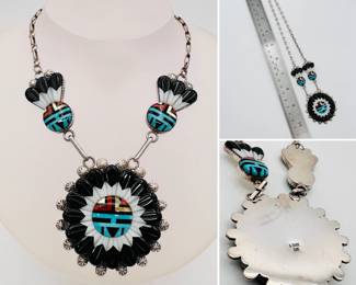 Incredible sun-face motif sterling silver necklace by the late Zuni artisan Andrew Dewa (d. 2001) inlaid with jet, mother of pearl, coral, yellow lip shell, and turquoise.