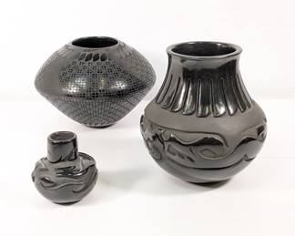 Beautiful art pottery including two pieces of Santa Clara Pueblo pottery by artists Sharon Naranjo Garcia, and Victor and Naomi Eckleberry, and a Mata Ortiz black pottery vessel signed by Chihuahua, Mexico artist Hilaro Quezada