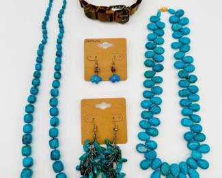 Beautiful turquoise bead necklaces with 14k yellow gold clasps, sterling silver and turquoise bear dangle earrings, a pair of turquoise nugget dangle earrings, and a tigers eye and sterling silver buckle bracelet