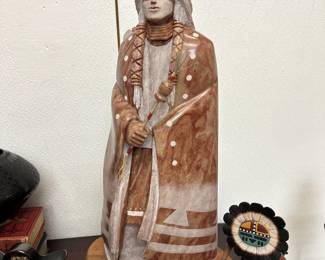A Navajo marble alabaster sculpture by Leslie Pablo (b. 1964), a well-known Navajo Native American artist who specializes in sculptures hand-carved from alabaster and marble. He has also been honored by having several of his pieces placed in the Smithsonian. This sculpture is 20-1/2 inches tall.