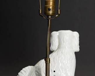 Reverse view of the vintage Staffordshire porcelain black and white dog figurine on wooden plinth with electrical lamp fitting