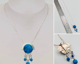 Native American style sterling silver and turquoise pendant on a sterling silver chain.