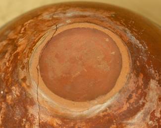 Closeup of the lovely large old Santo Domingo Pottery pot of the "Aguilar Type." Asunción Aguilar Caté and Felipita Aguilar Garcia, along with their sister-in-law, Mrs. Ramos Aguilar-are credited with this innovative style. They began experimenting around 1910 and introduced bold new patterns that used large areas of black and red, outlined with delicate cream lines. This departure from traditional techniques made their pottery highly sought after.