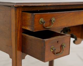 Closeup of the Chippendale Style Oak Mahogany Lowboy or Dressing Table, rectangular top with molded edge, three molded edge drawers, scalloped skirt, raised on straight square legs with molded edge.