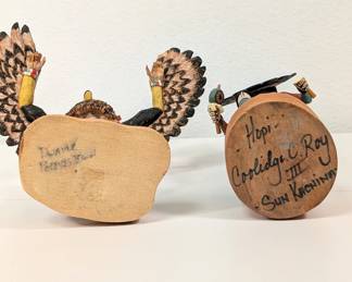 Another view of the two marvelous hand crafted Hopi Kachina dolls – one signed by Dwayne Poleyestewa, and one signed 'Hopi - Coolidge C. Roy III Sun Kachina'