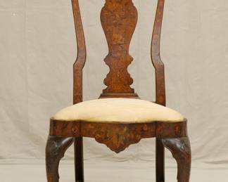 A Dutch Marquetry and carved wooden side chair, 19th Century, with bird, vase and floral inlaid vasiform splat, serpentine slip seat rail, shell cabriole legs, slipper feet.