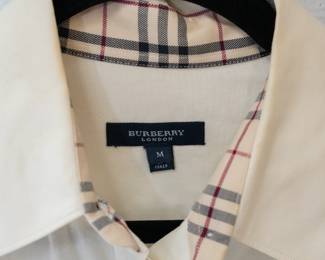 Closeup of the Burberry London cream color button front blouse, size M