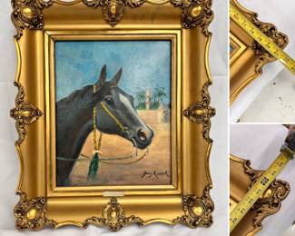 A beautifully framed naive painting of an Arabian horse, with minaret and palm trees in background; signed by artist