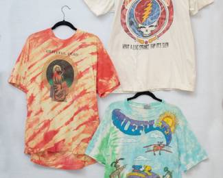 Vintage Grateful Dead t-shirts: A Grateful Dead 'Blues for Allah' tie-dye t-shirt, a Grateful Dead skull 'What a Long Strange Trip It's Been' t-shirt, and a Grateful Dead Spring Tour Liquid Blue tie-dye t-shirt