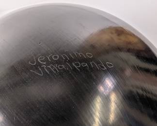 Closeup of the striking matte on black painted design hand coiled pottery olla signed Jeronimo Villalpando from Mata Ortiz in Chihuahua Mexico