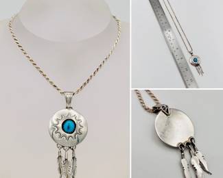Native American style silver and turquoise colored stone shadowbox shield pendant with three dangling feathers on a sterling silver chain.