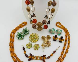 A variety of vintage costume jewelry, mostly European