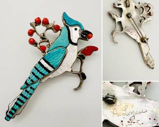 A stunning Native American Zuni sterling silver Blue Jay multi-color inlay pin pendant by artist Andrea Lonjose, who specializes in inlay depicting animals, Zuni Kachina figures and other realistic characters found on the Zuni reservation.