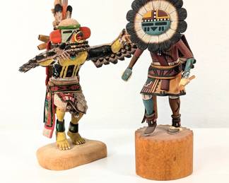 Two hand crafted Hopi Kachina dolls – one signed by Dwayne Poleyestewa, and one signed 'Hopi - Coolidge C. Roy III Sun Kachina'