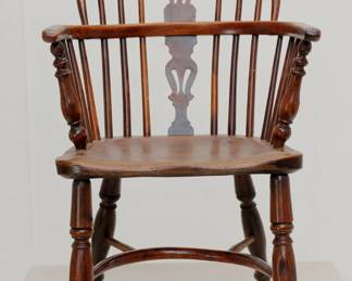 View of one of the set of 3 Matched Windsor Chairs c. 1780, English