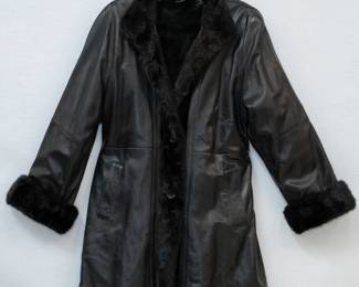 Black leather hip-length coat with fur trim
