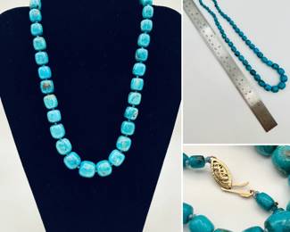 Closeup of turquoise bead necklace with 14k yellow gold clasp