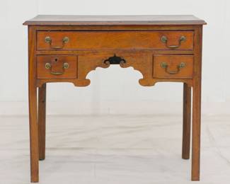Chippendale Style Oak Mahogany Lowboy or Dressing Table, rectangular top with molded edge, three molded edge drawers, scalloped skirt, raised on straight square legs with molded edge.