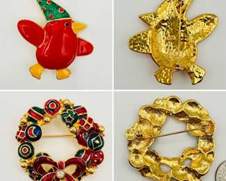 A nice selection of Christmas holiday brooches in enameled gold metal