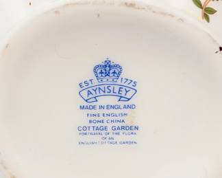 Closeup of Aynsley fine English bone china cache pot, pitcher or creamer, and bud vase in Cottage Garden pattern