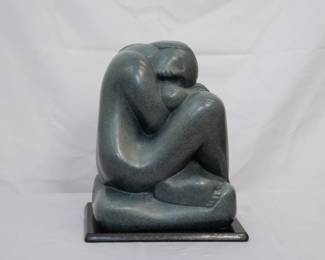 A signed bronze abstract sculpture of embracing couple, "Mon Petit Amour" by artist Ken Patecky