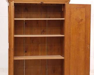 A 19th century American pine two door armoire/cupboard