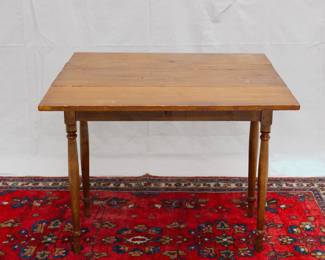 A vintage drop leaf table