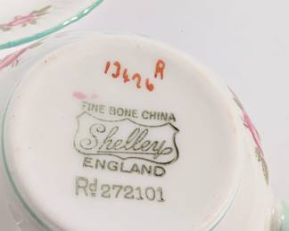 Closeup of the Shelley England Fine Bone China cup and saucer with roses pattern