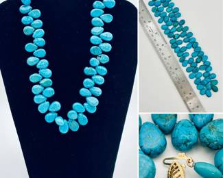 Closeup of turquoise bead necklace with 14k yellow gold clasp