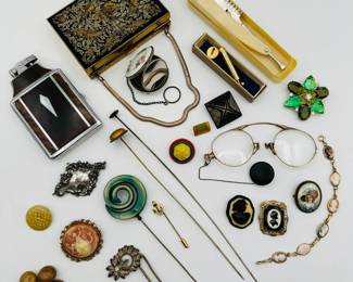 Antique hat pins, cameos bracelet, a vintage pince-nez with a Ketcham & Mcdougall retracting chain brooch case, a tiny vintage brass "flit gun" shaped perfume atomizer with original box, some lovely brooches, a vintage tabletop combination lighter and cigarette case, a collection of vintage/antique buttons, and a A vintage hand embroidered and gold tone metal makeup compact wrist purse, with serpentine chain handle; the interior with a mirror (with space behind it for cigarettes, cards, cash), a lidded powder compartment with powder puff, and lipstick tube