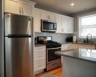 Recently updated kitchen is clean & contemporary