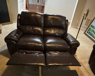 Leather reclining loveseat 