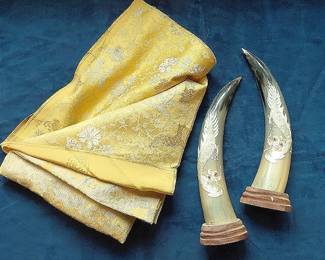 Hand Carved Horns And Decorative Fabric