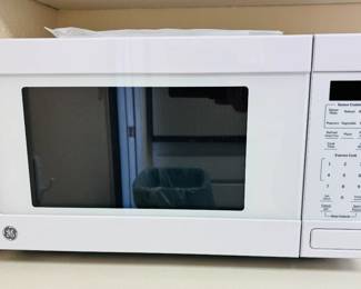 GE Microwave - New - 1 year old
