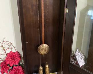 Clock needs a little TLC in the time setting but it works and has a beautiful tone. Wood cabinet and clockworks in excellent condition.