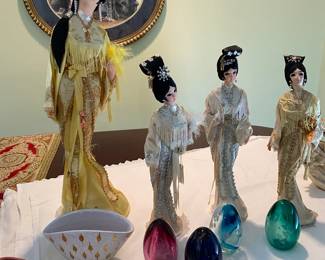 Hand blown glass eggs signed by Doris Clemens. Geisha dolls from Japan.