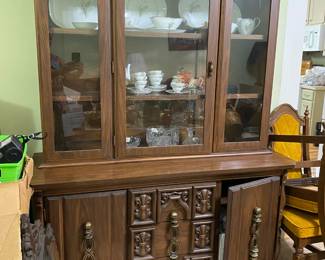 China cabinet and beautiful "lily" china set.  Service for 12.  Can you zoom to see the tea set?