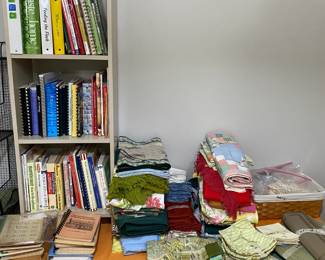 Cookbooks, many local and vintage!  Table linens galore.