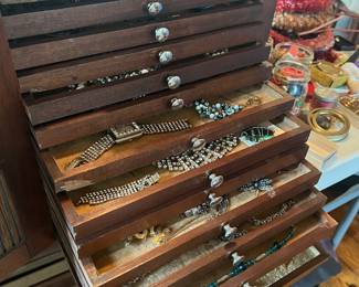 Lots of jewelry in an eye-catching piece of furniture! Find something you love! 