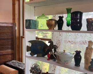 Glass decorations, a vase to display flowers, and art deco items, and epression glass too!! 