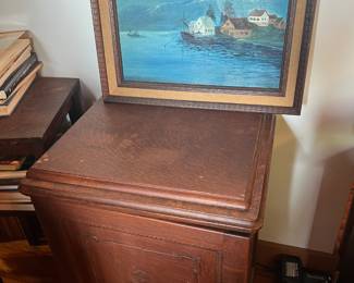 A wooden storage piece and a beautiful picture to add to your decor! 