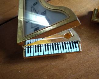 Piano shaped small shelf decor clock.